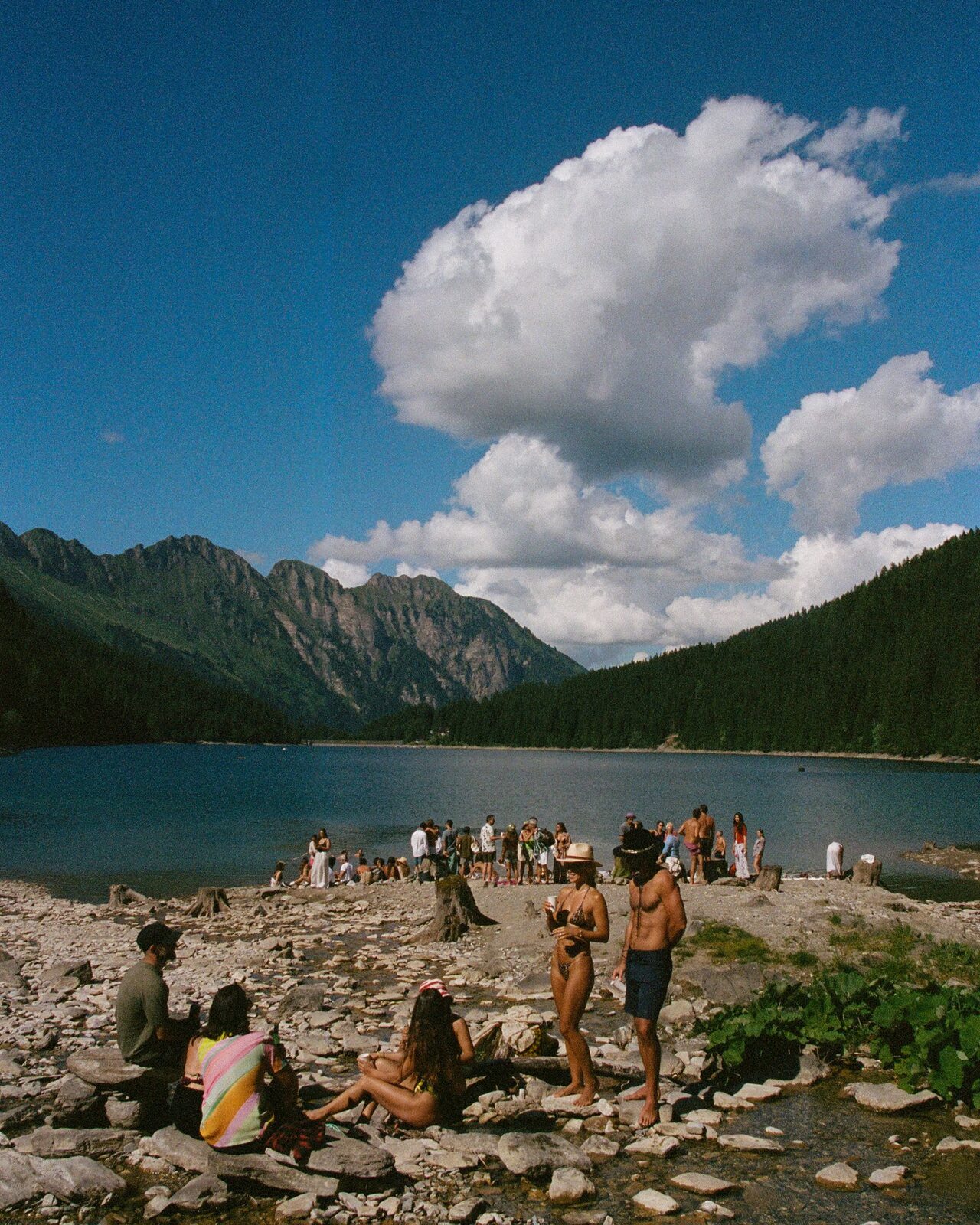 Guests on the rocky lakeshore